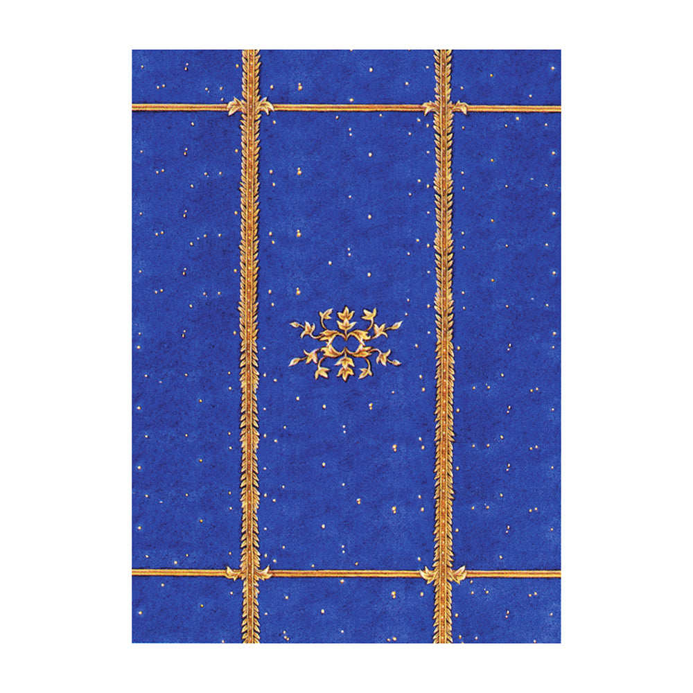 Decorative blue paper with gold patterns and a star design on a white background