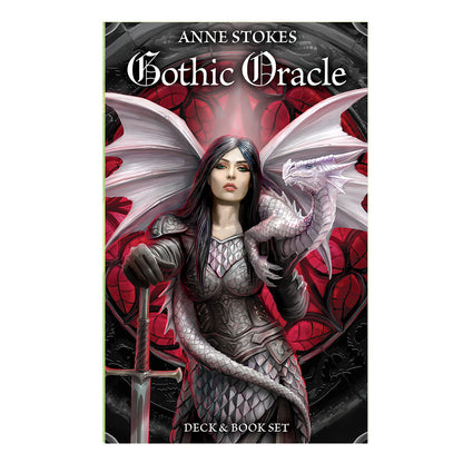 Cover of Anne Stokes Gothic Oracle deck. Features a dark haired woman night clutching a broadsword with a young pink dragon on her shoulders. The background is a blood red stained glass window.