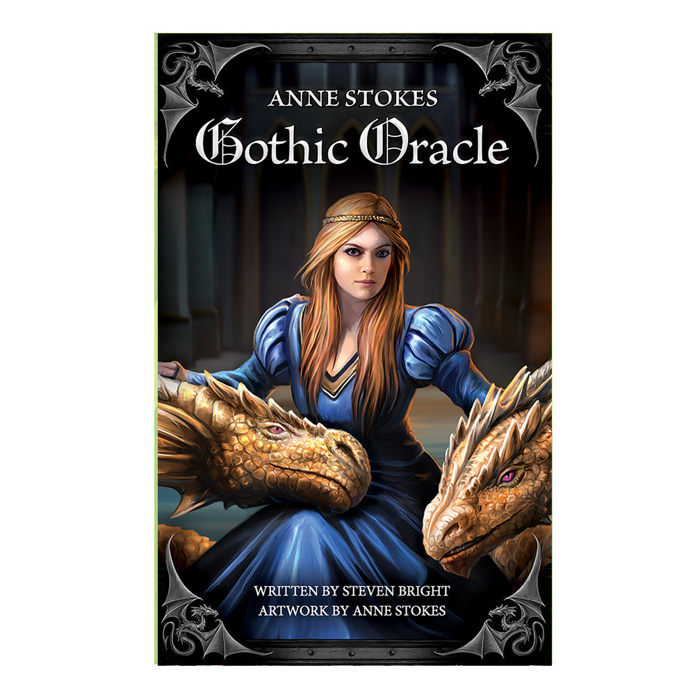 Cover of Anne Stokes Gothic Oracle Deck's included booklet. Features a a royal woman wearing a fairy tale blue dress and gold headband flanked by two gold/bronze dragons.