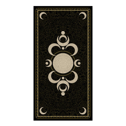 Decorative card with intricate gold design on a black background