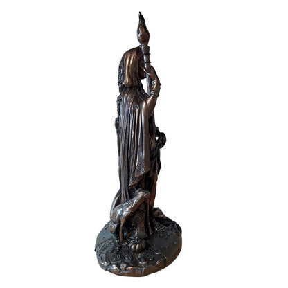 Statue of Hecate holding a torch and a dagger flanked by black dogs and standing close to a skull (seen from the right side).