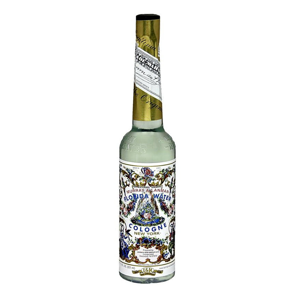 Bottle of Murray & Lanman's Florida Water Cologne with the iconic original old school label featuring florals and Edwardian era framework.