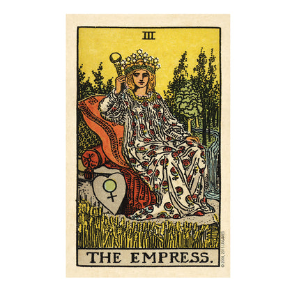 Tarot card featuring 'The Empress' with a woman in a floral dress sitting on a throne.
