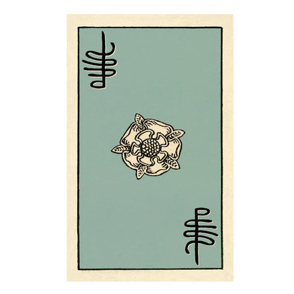 Tarot card with a floral design and symbols on a green background