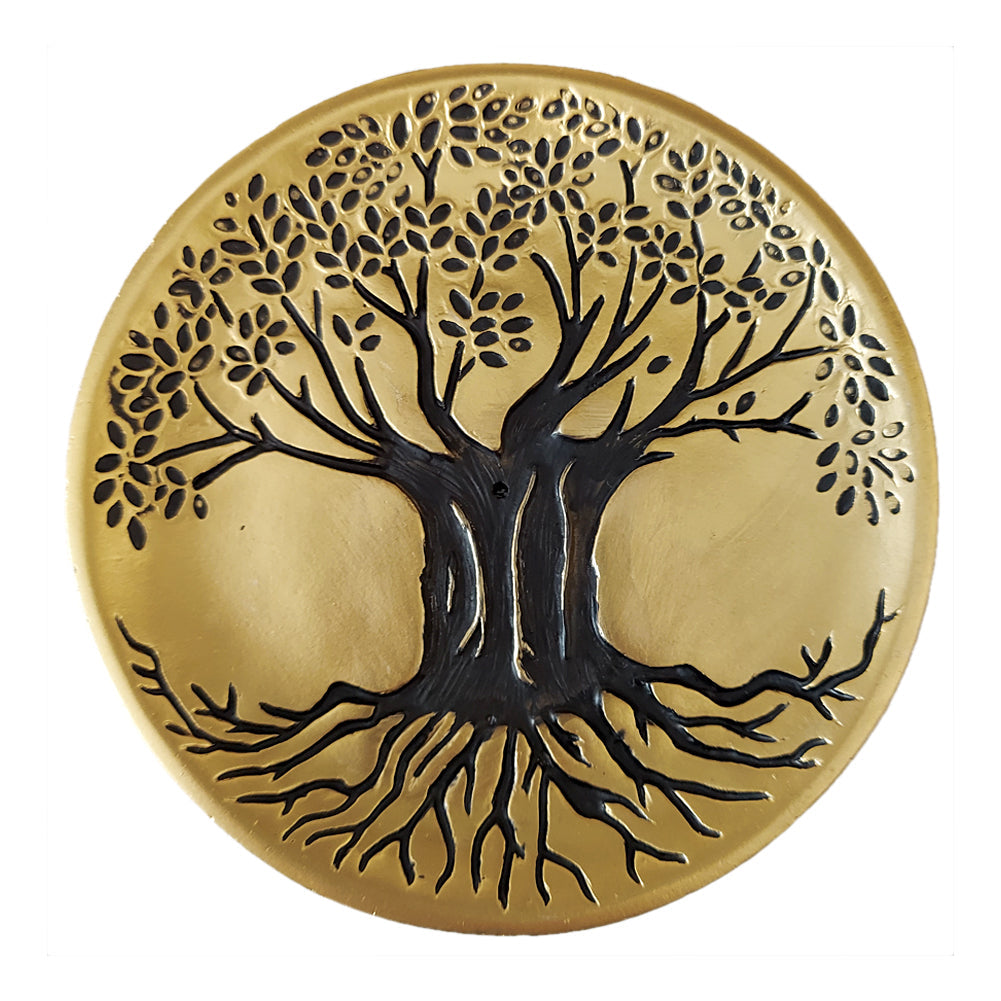 Decorative plate with a tree of life design on a gold background