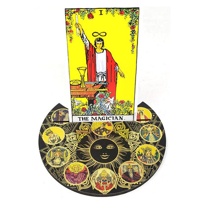Tarot card featuring 'The Magician' with a decorative border is sitting on a tarot holder featuring a sun design.